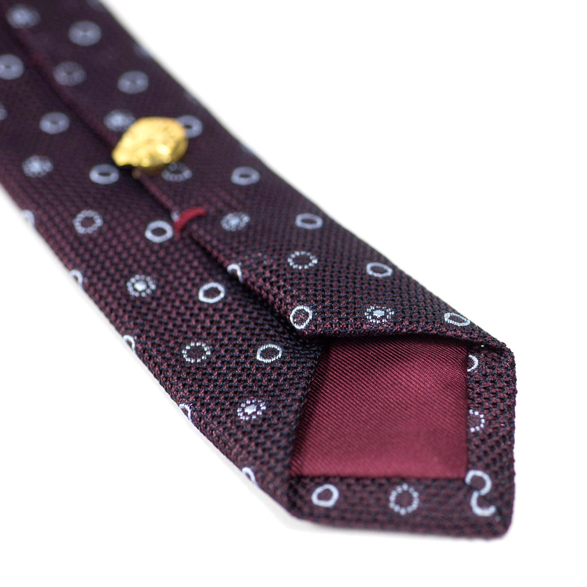 Burgundy woven silk tie, light blue circular motifs