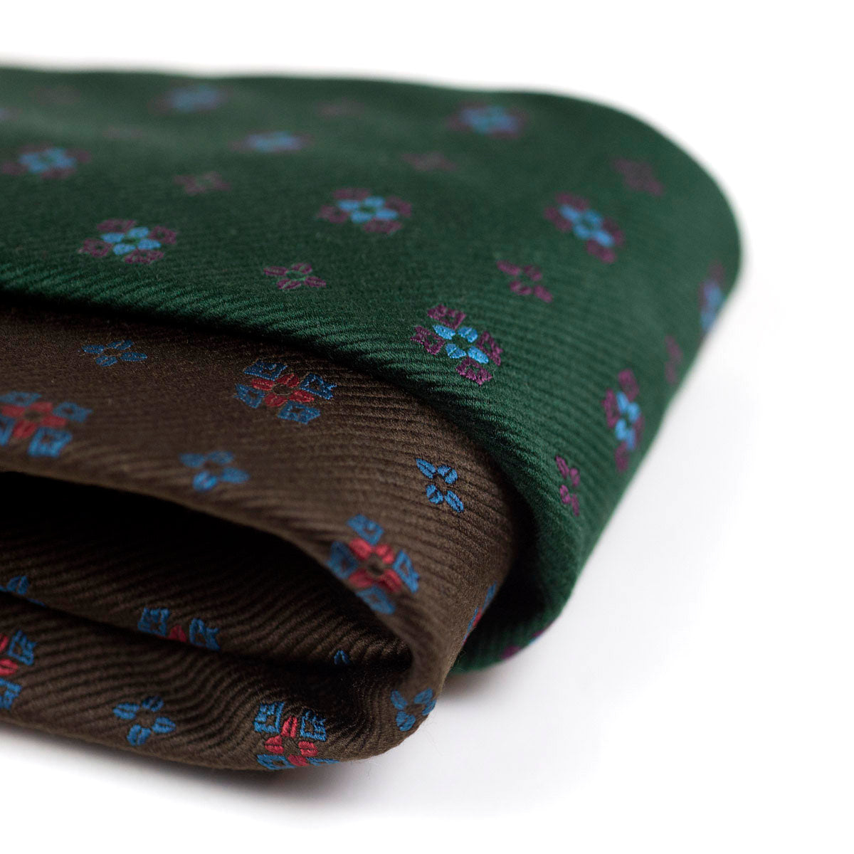 Green woven repp silk tie, blue & purple neat motifs