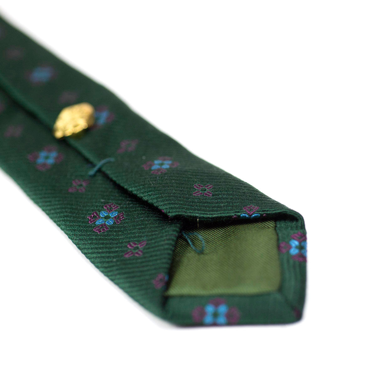 Green woven repp silk tie, blue & purple neat motifs