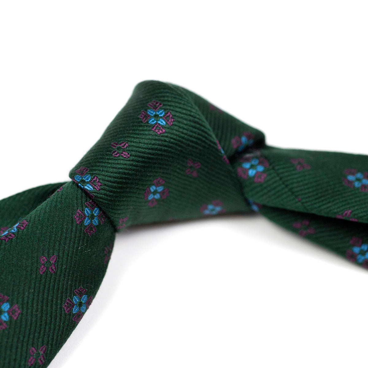 Green woven repp silk tie, blue & purple neat motifs