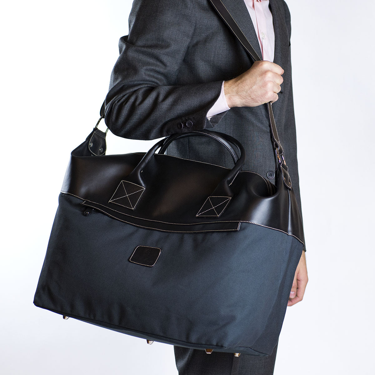 Black leather and petrol blue cotton canvas duffel bag