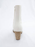 white store western style bootie from back