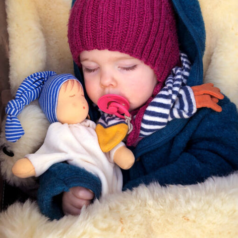 baby sleeping with Nanchen sleepy doll blue