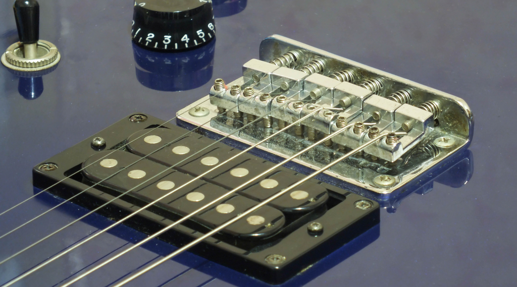 String-through hardtail guitar bridge