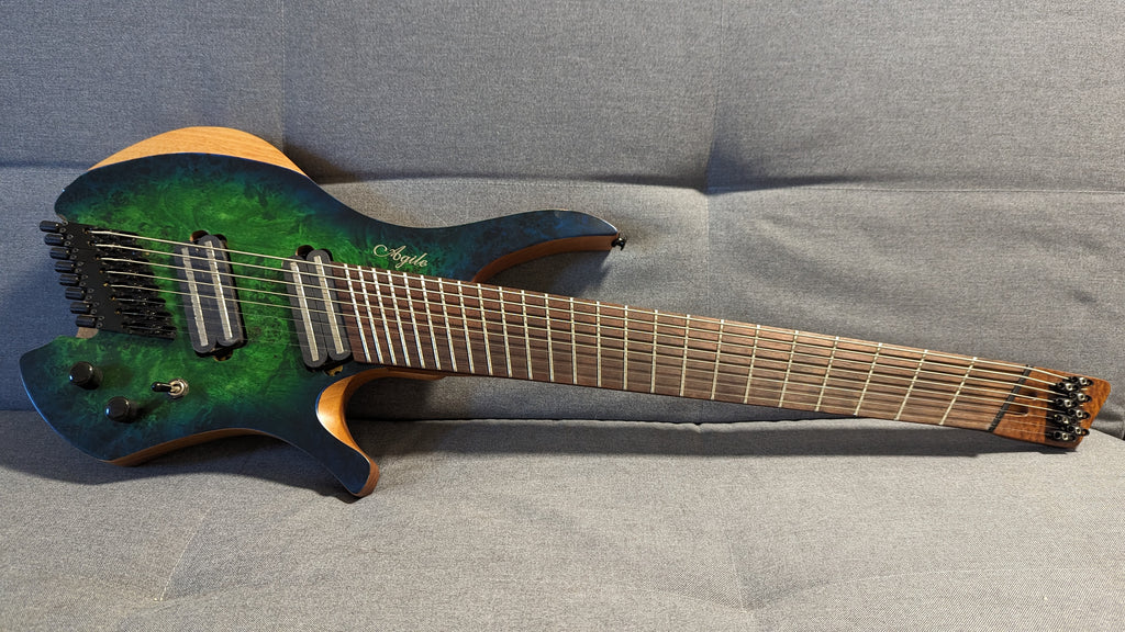 8-string multi-scale headless guitar - Ploutone