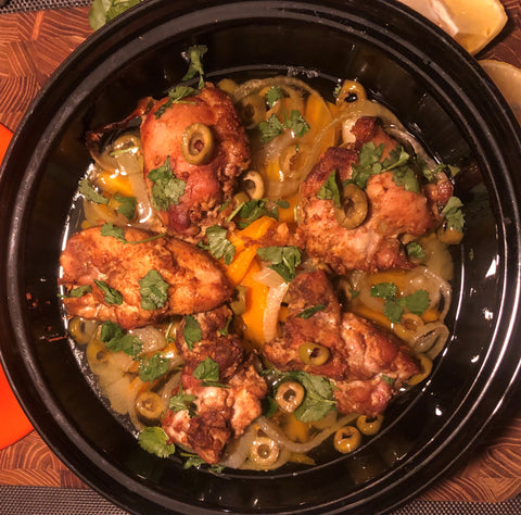 Recipe: how to make Moroccan Chicken Tajine? Typical North African dish Traditional cooking pot with chicken thighs