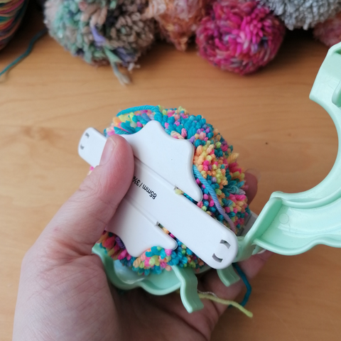Make a perfect pom pom with a maker and yarn