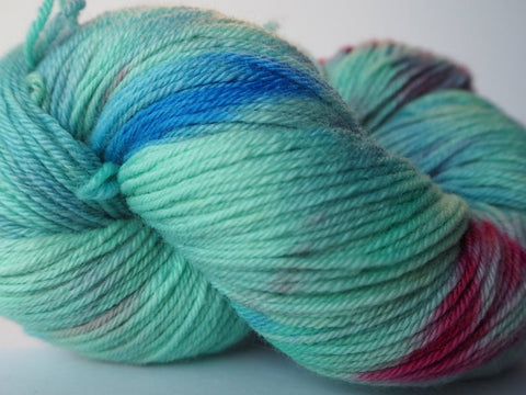 hand dyed yarn in jade, blue and raspberry colours