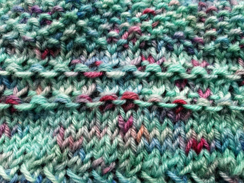 close up on the cowl texture, achieved by chosing different stitch patterns