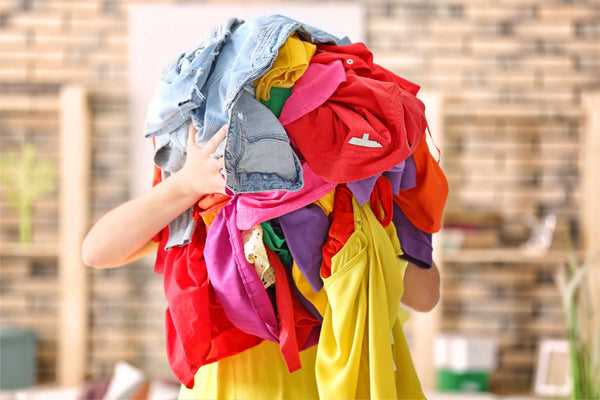 Sorting out your old clothes is a great way to de-clutter