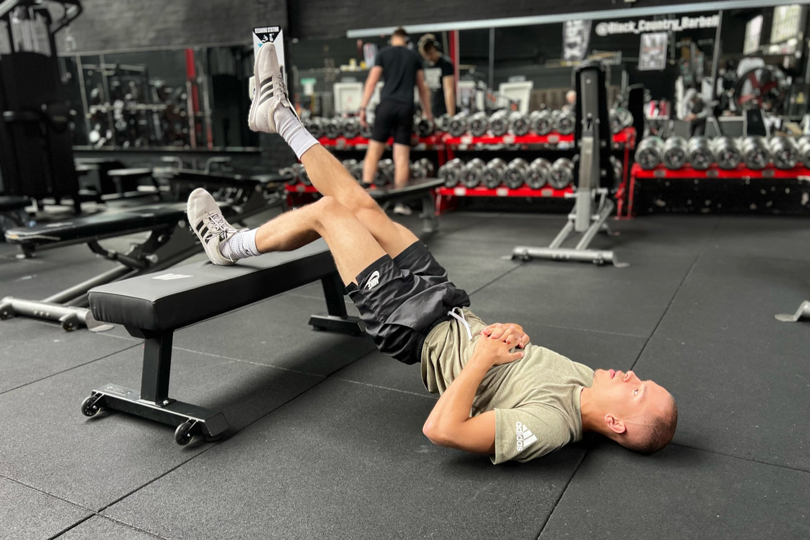 Athlete performs single leg glute bridge using Milway Performance Weights Bench