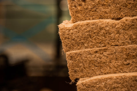 Closeup view, stack of fibrous hemp batt insulation