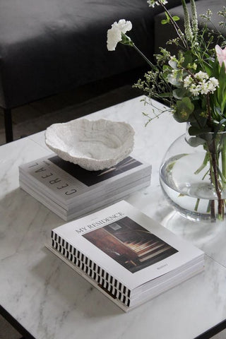 coffee table books stacks white marble