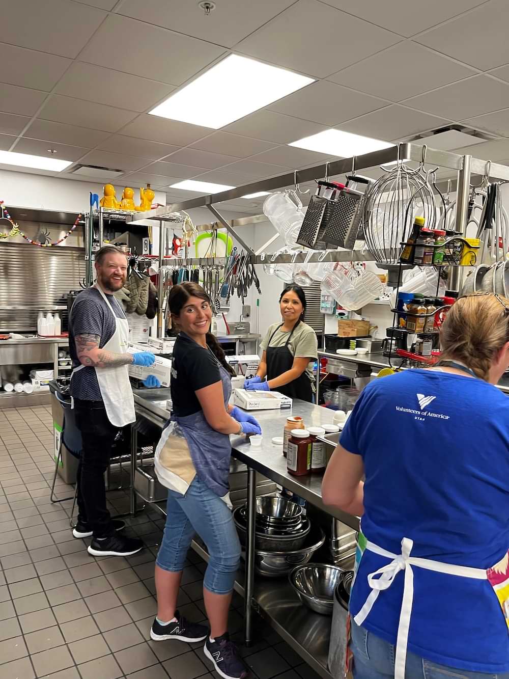 SeroVital team members serving food to women experiencing homelessness