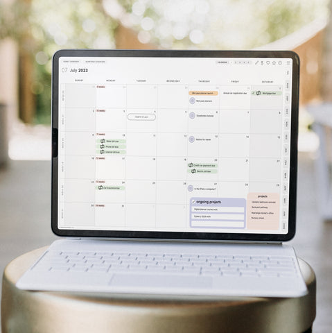 A filled out monthly page layout of the Cyberry Mid-Year Digital Planner on iPad