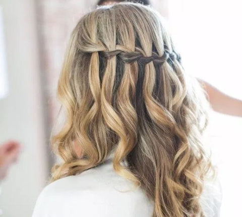 The waterfall braid is one of the classiest hairstyles you can do with your Minque halo hair extensions. 