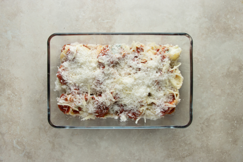 Add the mozzarella cheese and the parmigiano reggiano to the mixture and bake