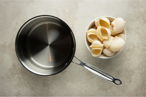 Bring water to a boil and add lumaconi pasta