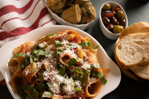 Old classic basil pappardelle pasta with classic tomato sauce by TerraMar Imports. Italian cuisine.