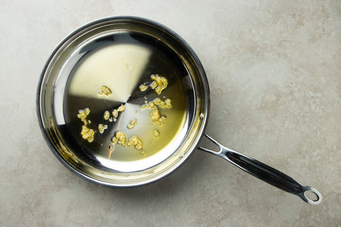 Sautee garlic in extra virgin olive oil