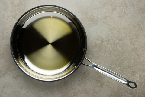 Heat olive oil in a medium sauce pan