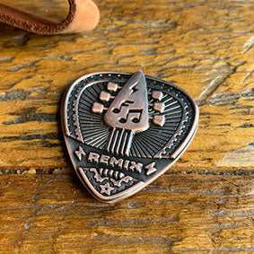 Band or Album Remix coin on distressed table