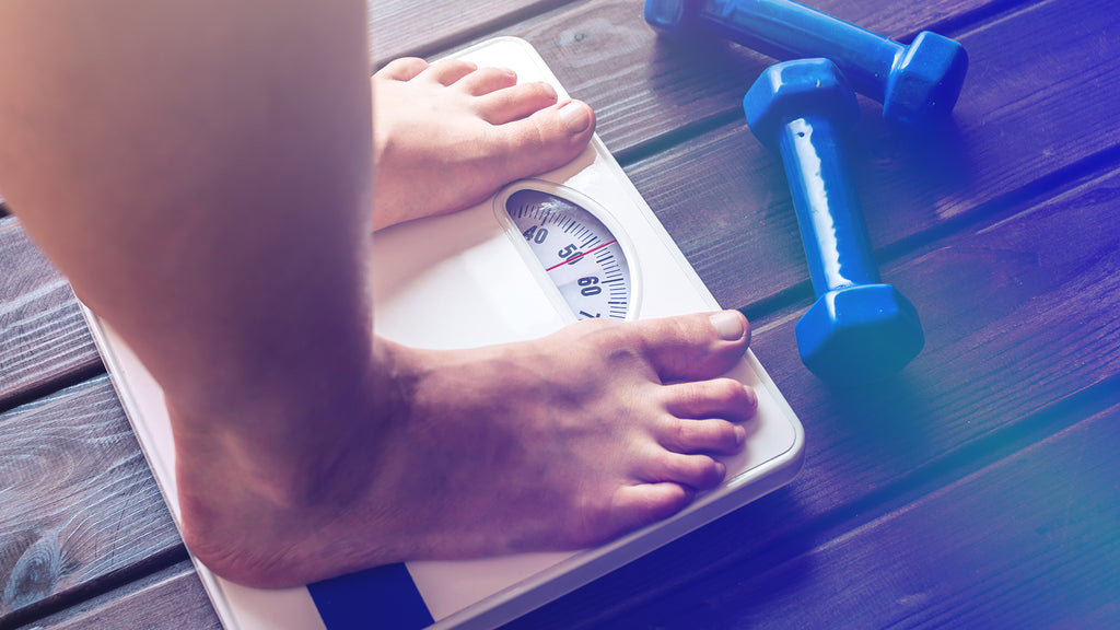 stepping on a scale weight loss