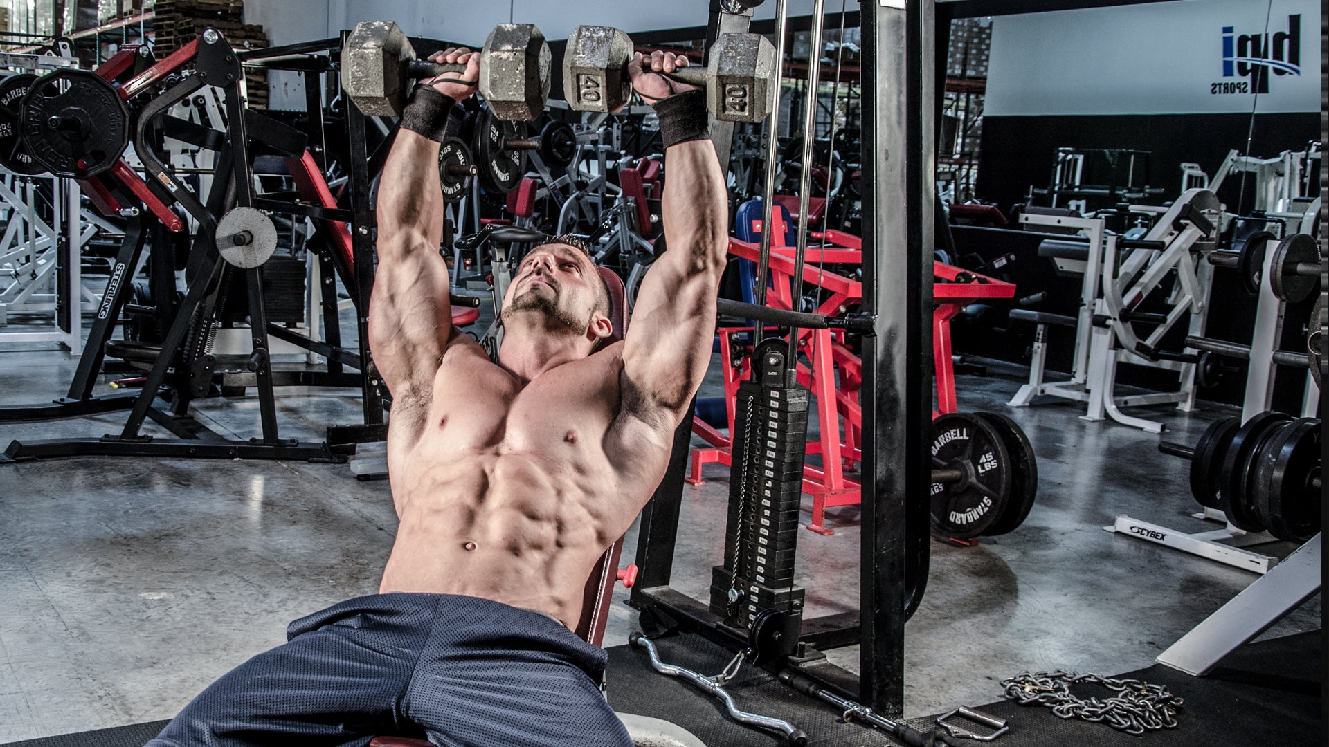 weights in the background with the gym.