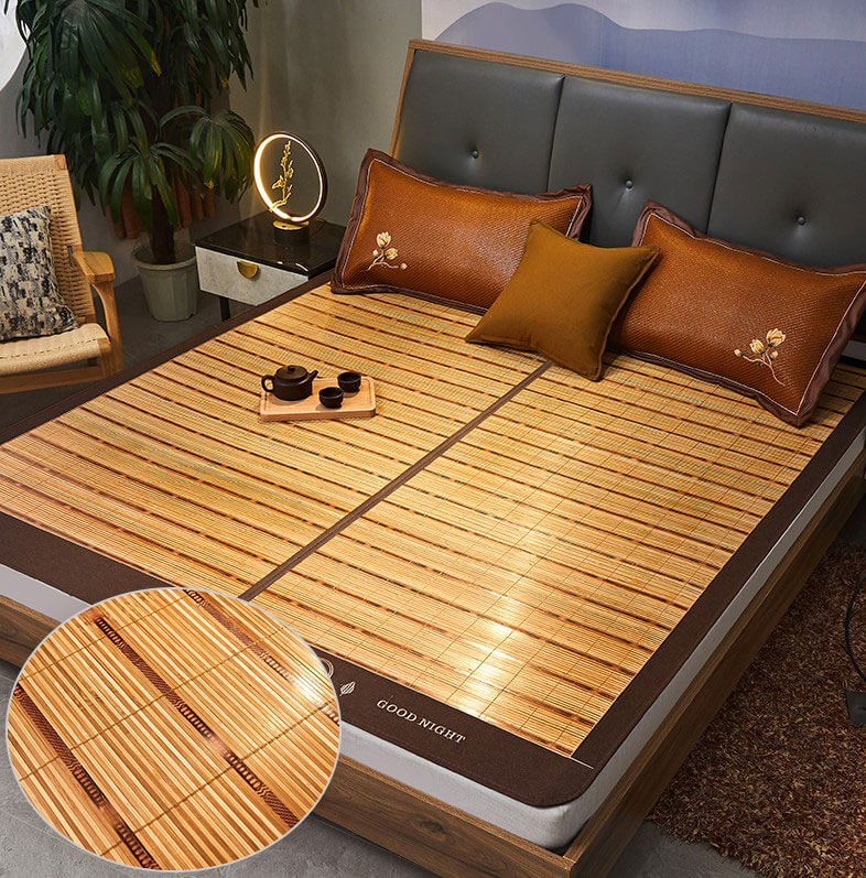 https://cdn.shopify.com/s/files/1/0561/9987/2670/files/A-bed-with-a-bamboo-mat-and-pillows-on_40d4e934-43ee-4c96-8433-840d5df11add.jpg?v=1623913340