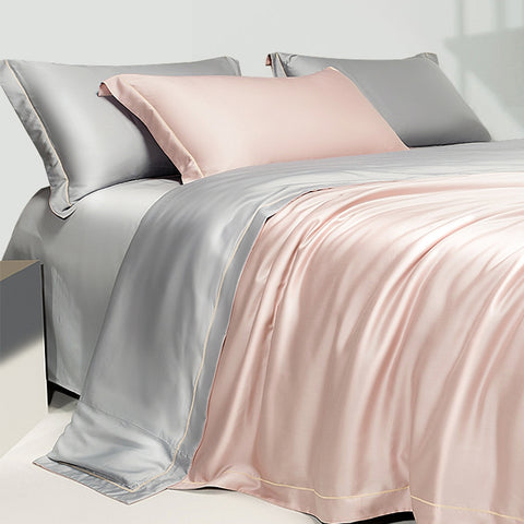 gray and pink Tencel sheets and pillows
