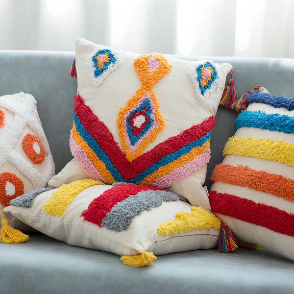 colorful embroidered tufted boho throw pillows with tassels