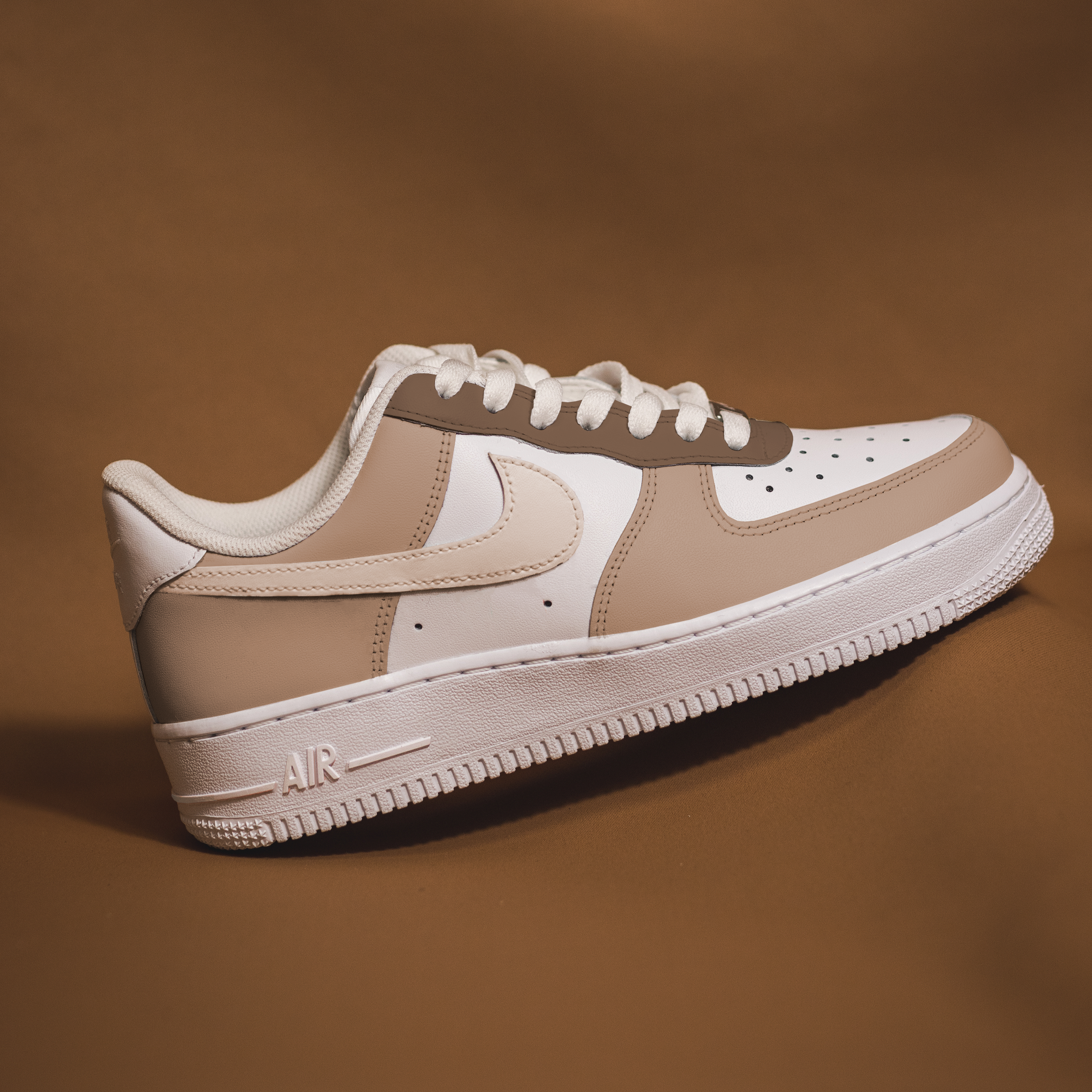 white and brown air force ones