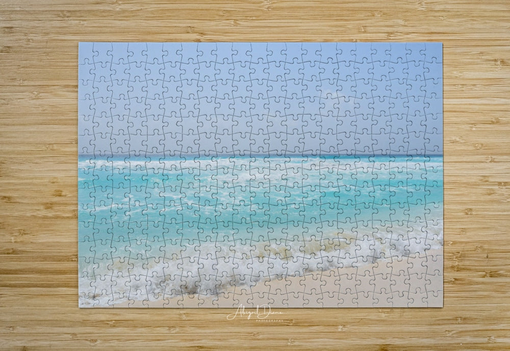 puzzle of ocean blues of  Caribbean waves crash on the beaches in Cancun Mexico,