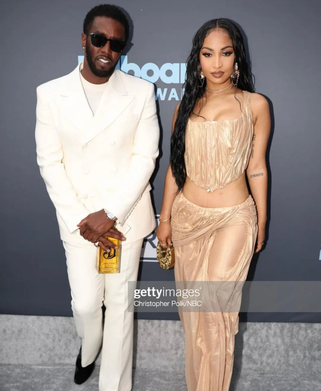 Diddy and Sehenseea clutching Blumera at the Billboard Music Awards