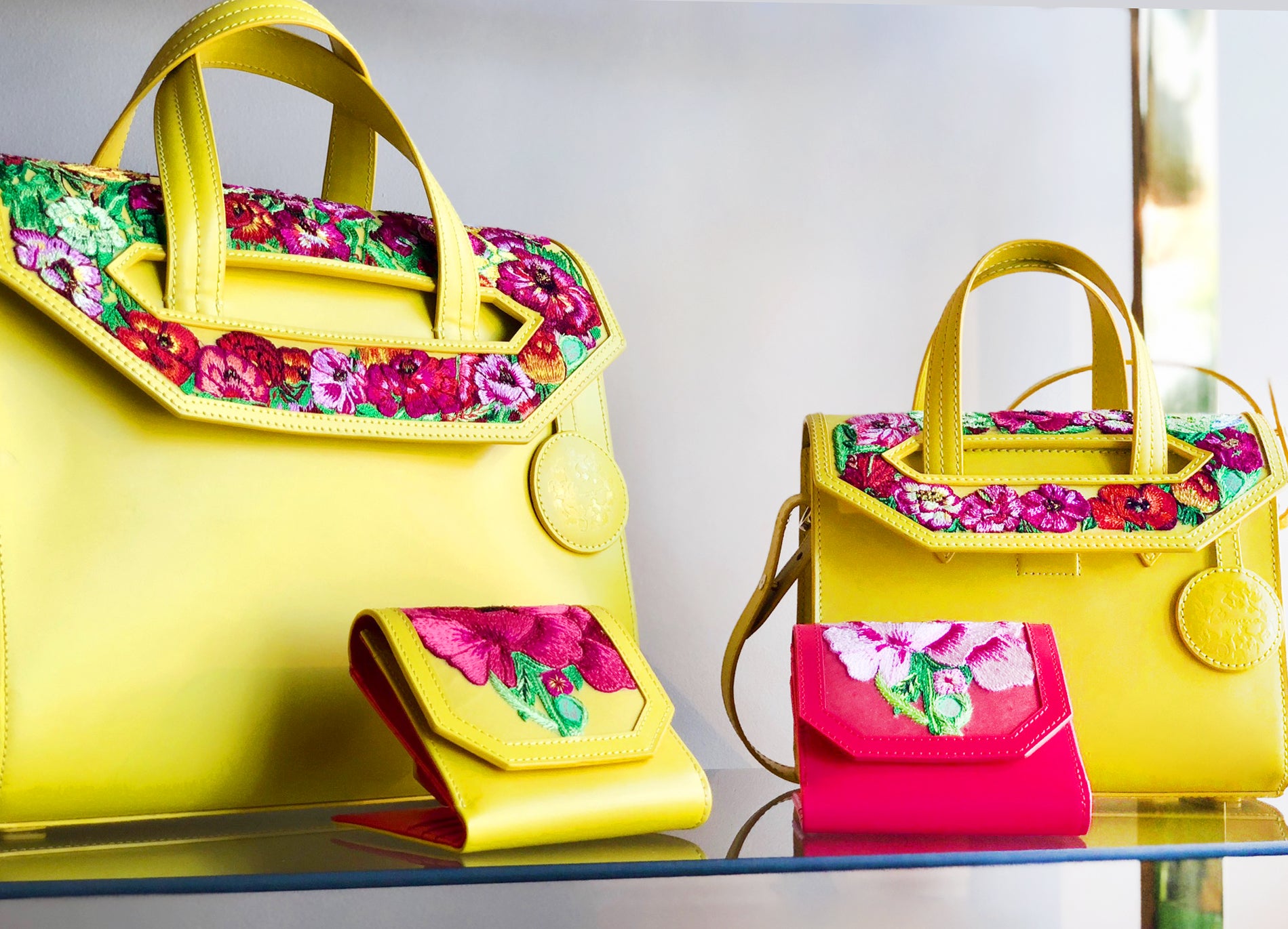 Most gorgeous bags luxurious handbags in yellow, magenta, and beige, hand-embroidered with poppies in exquisite detail. Stunning purse to behold.