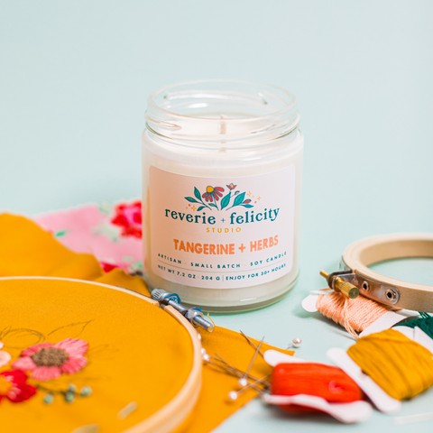 Tangerine + Herbs scented soy wax candle from Reverie + Felicity Studio