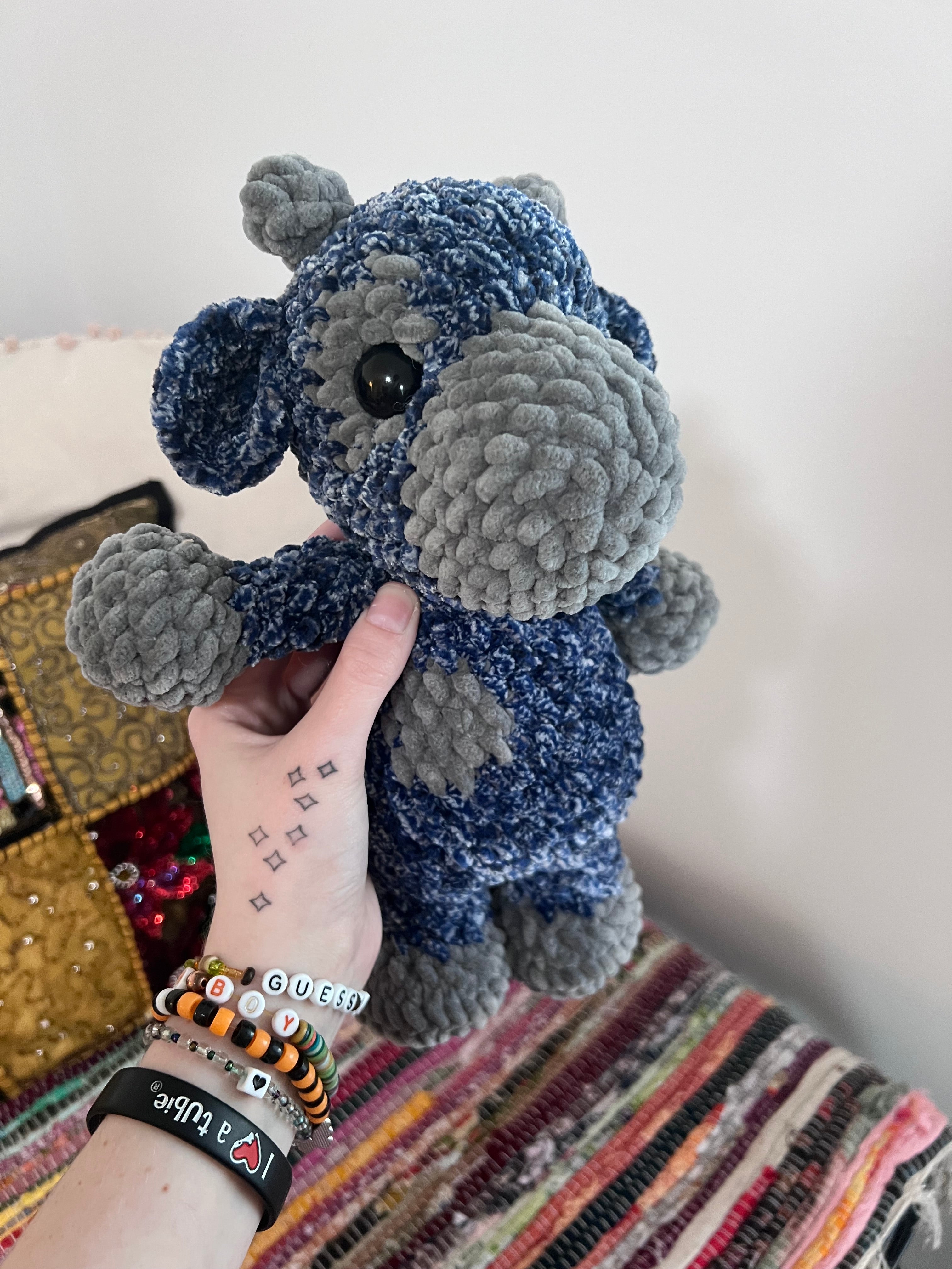 Blue and grey speckled cow plushie