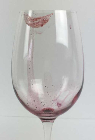Polishing wine glasses with wine cloth
