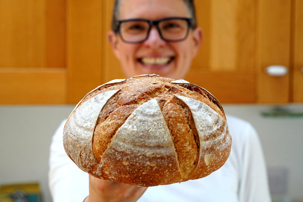 Elaine Boddy and one of her famous sourdough loaves