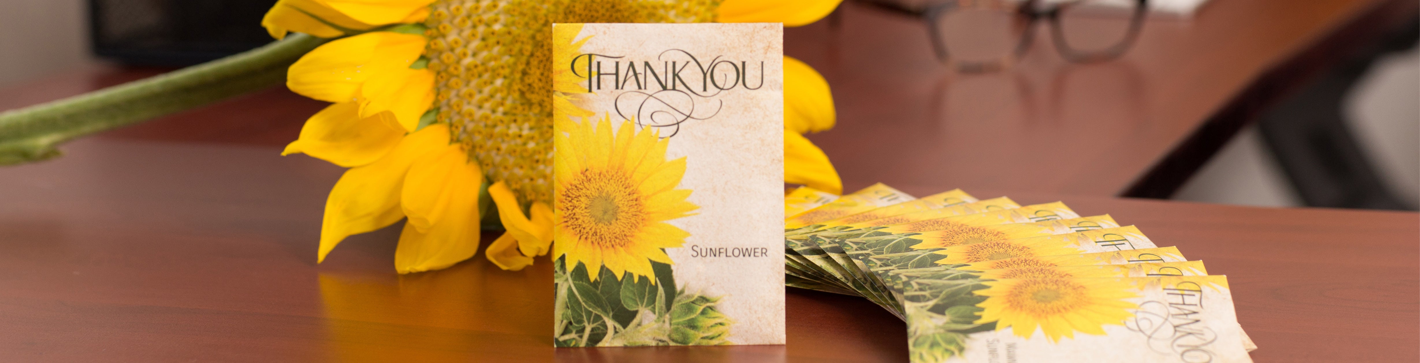 Thank You Sunflower Packet with sunflower at office desk