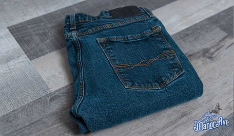 A pair of Levi's Denizen blue jeans