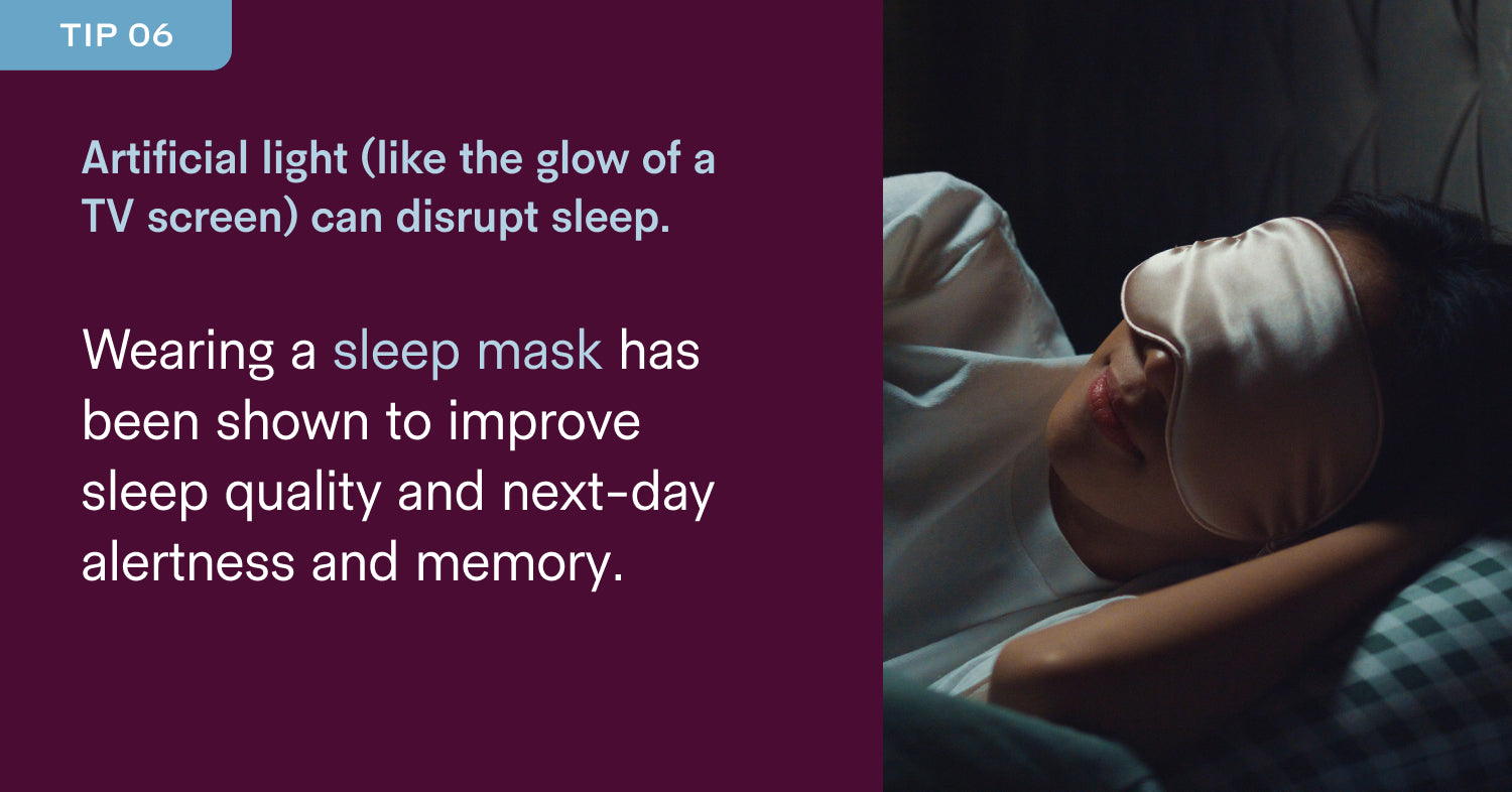 Woman wearing a sleep mask in bed, suggesting blocking artificial light for sleep.