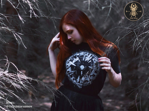 girl wearing mushroom t-shirt in the forest