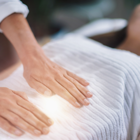 Woman receiving healing touch