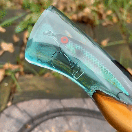 A gif mostra em datalhes a faca artesanal pescador - cabo isca de peixe