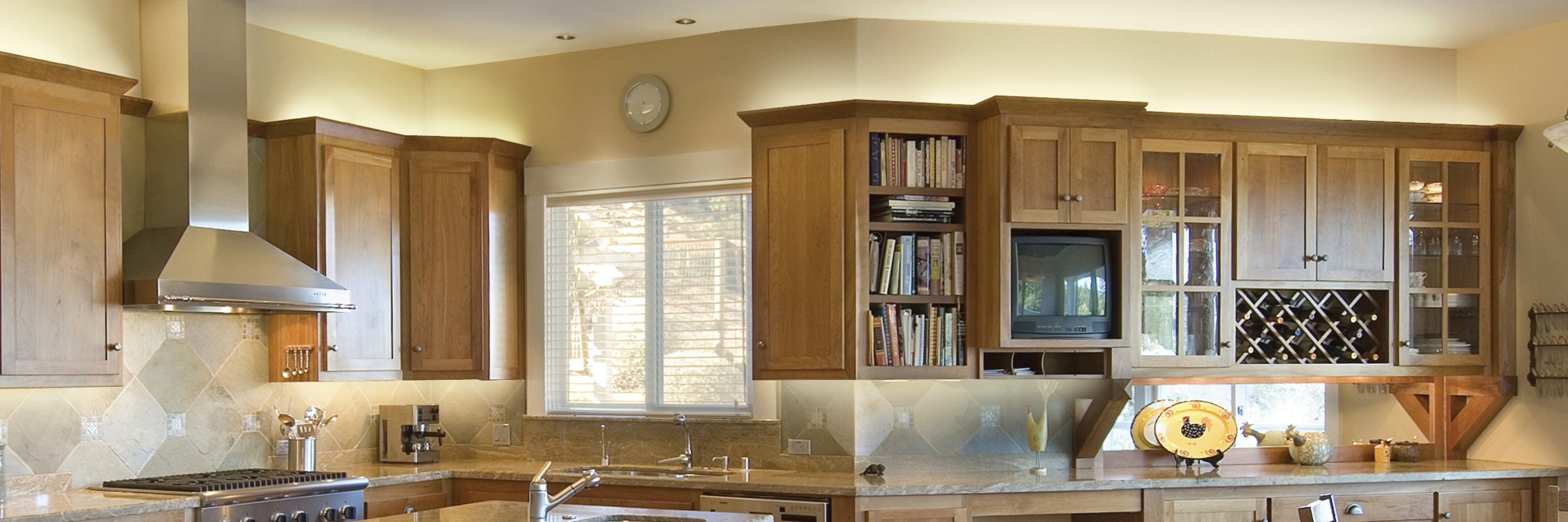 LED strip lights above cabinet toward ceiling