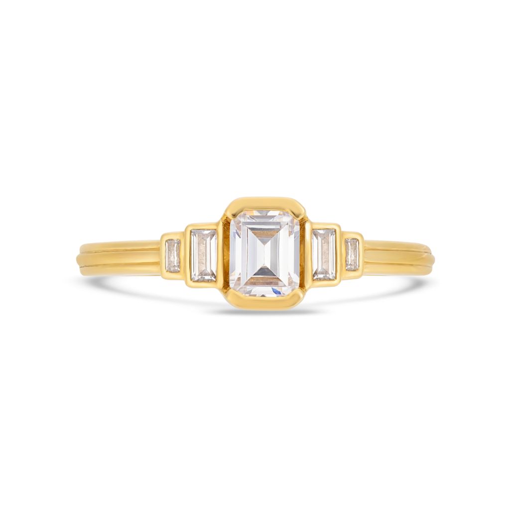 Emerald cut diamond engagement ring in yellow gold 