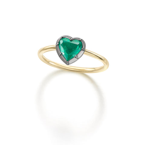 Heart shaped emerald button back ring by Jessica McCormack