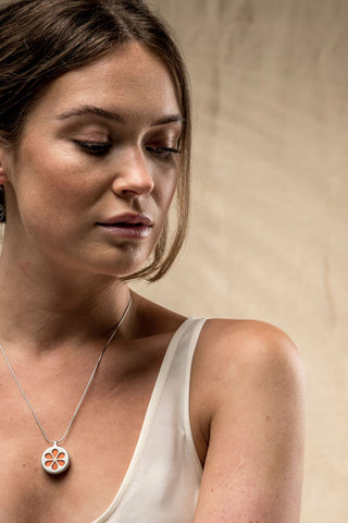 Female model wearing Orange Orchid Necklace