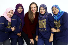batik boutique amy with artisans seamstresses